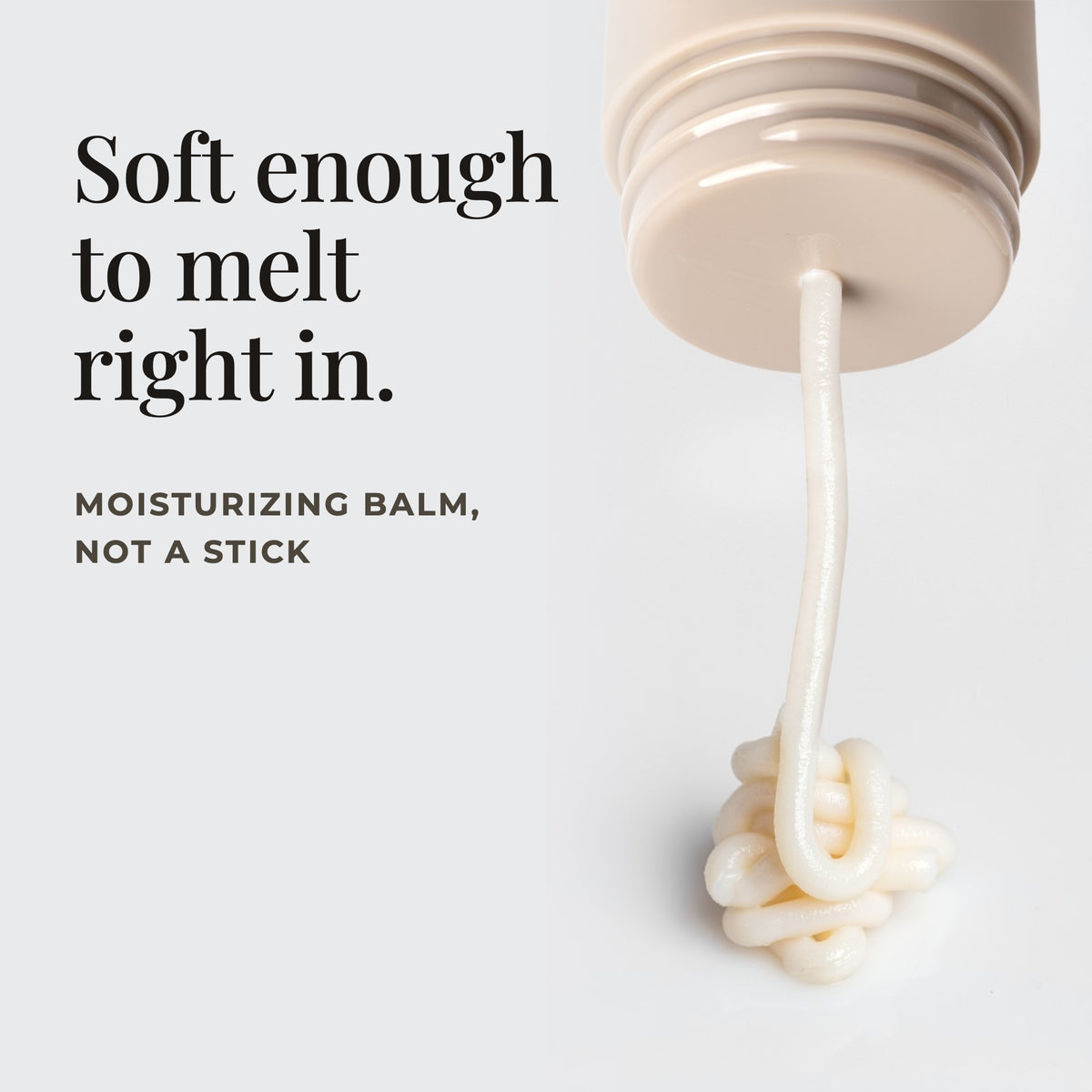 Roon Coconut Shore balm dispensing from its twist-up tube — a moisturizing balm, not a stick